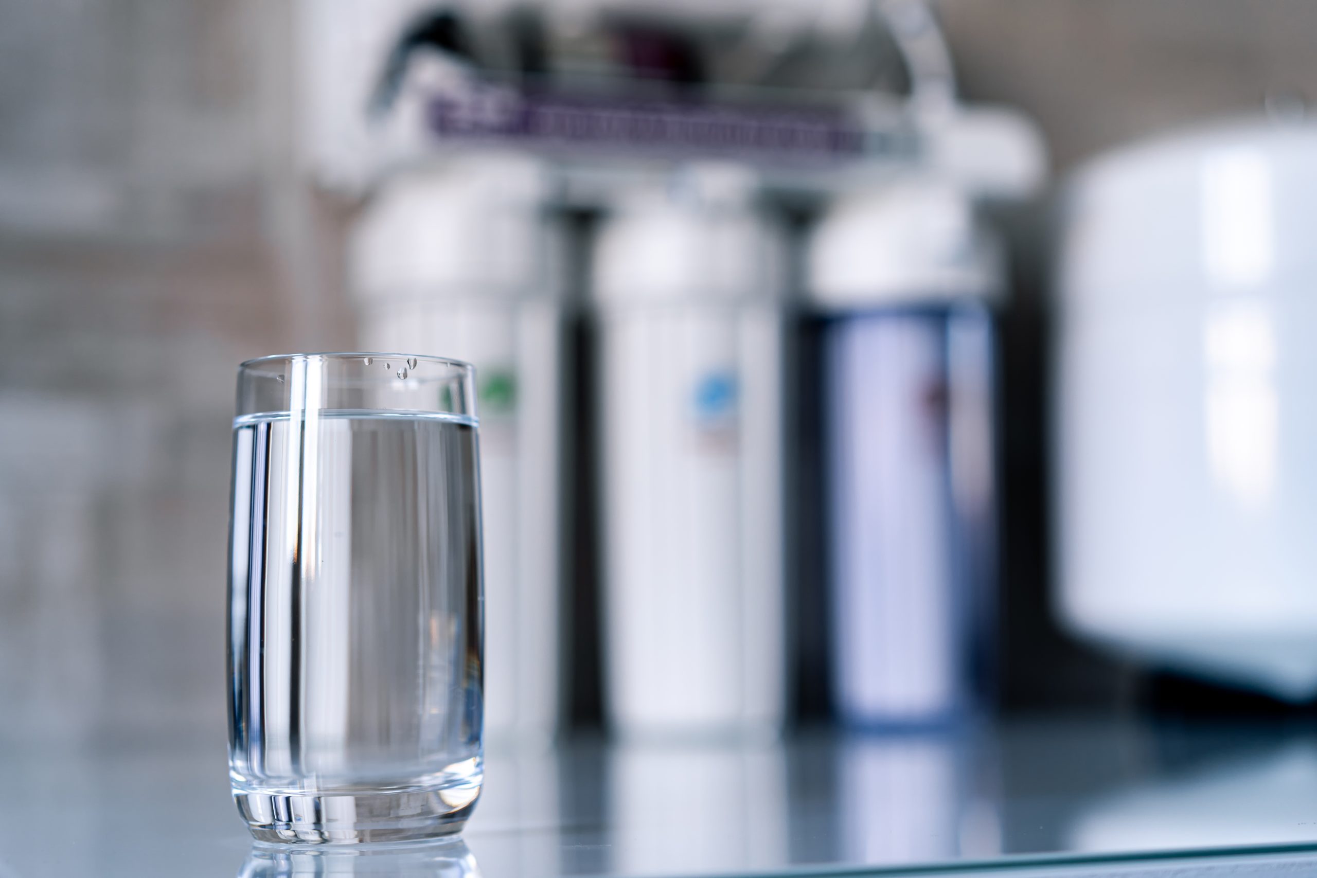 pure-water-glass-water-filters-blurred-background-household-filtration-system-scaled